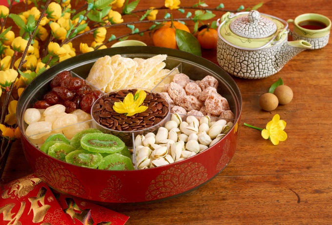 Kẹo, mứt ngày Tết chứa lượng đường cao, không tốt cho sức khỏe nếu ăn nhiều. Ảnh: Freepik