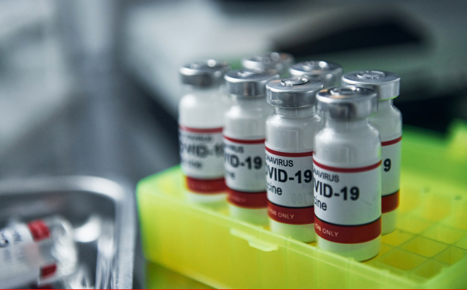 Minh họa vaccine Covid-19. Ảnh: Vecteezy